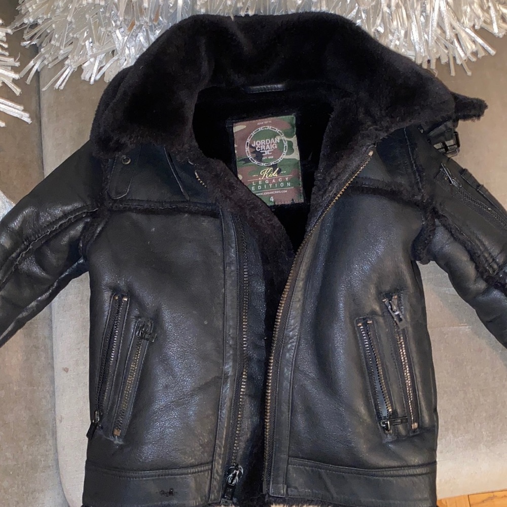 Black shearling coat for a size 4 toddler.